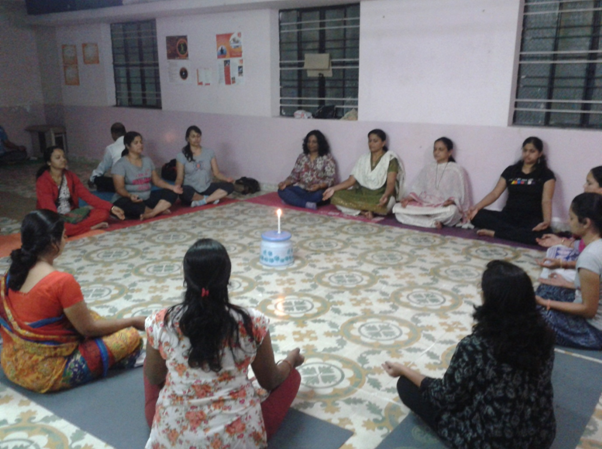 Group practicing Pranayama yoga breathing